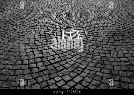 Strada marciapiede blocchi. Motivo a forma quadrata. Primo piano. Foto Stock