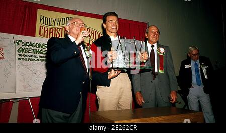 Arnold Schwarzenegger partecipa alla 59a parata annuale di Natale di Hollywood il 25 novembre 1990 a Hollywood, California. Credito: Ralph Dominguez/MediaPunch Foto Stock