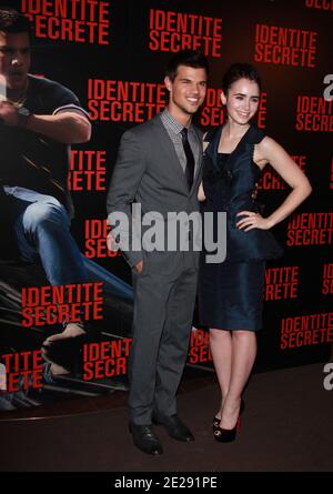 Taylor Lautner e Lily Collins in occasione di una prima francese di "Identite secrete" (Abduction) tenutasi a Gaumont Marignan a Parigi, Francia, il 27 settembre 2011. Foto di Denis Guignebourg/ABACAPRESS.COM Foto Stock