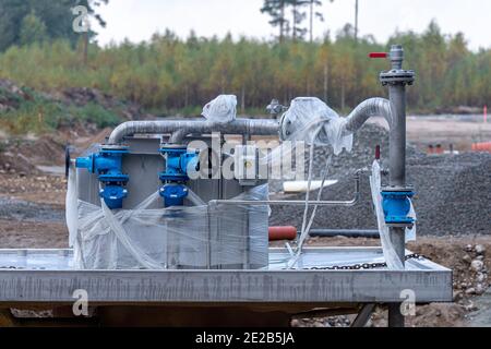 Costruzione di impianti fognari, impianti fognari sanitari e stazioni di pompaggio. Foto Stock