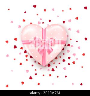 Regalo in scatola a forma di cuore con arco di seta rosa. Regalo per San Valentino confetti decorati. Vettore Illustrazione Vettoriale