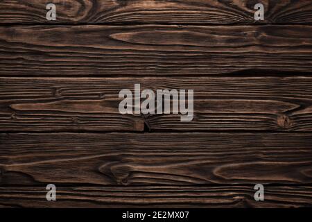 Legno marrone scuro bordi tessitura sfondo Foto Stock