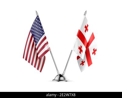 Desk bandiere, Stati Uniti d'America e Georgia, isolati su sfondo bianco. Immagine 3D Foto Stock