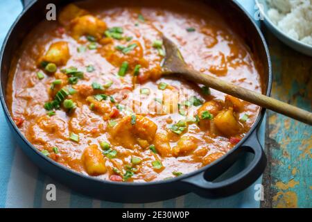 Curry con gamberi e pepe rosso e capesante Foto Stock