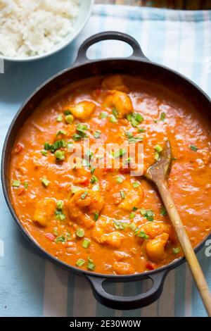Curry con gamberi e pepe rosso e capesante Foto Stock