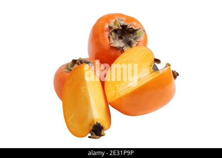 Persimmons interi e tagliati isolati su bianco Foto Stock