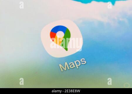 Un primo piano del logo dell'applicazione per Google Maps - un servizio di mappatura web sviluppato da Google, su uno schermo di un telefono cellulare Foto Stock
