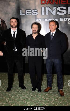 (Da sinistra a destra) l'attore Liev Schreiber, il regista statunitense Edward Zwick e l'attore britannico Daniel Craig posano durante una fotocellula per il film di Zwick 'Les insurges' il 7 gennaio 2009 a Parigi. Il film sarà pubblicato su schermi francesi il 14 gennaio 2009. Foto di Mehdi Taamallah/ABACAPRESS.COM Foto Stock