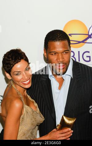 Il giocatore di NFL Michael Strahan e Nicole Murphy parteciperanno agli arrivi per il Clive Davis Pre-Grammy Party al Beverly Hilton Hotel il 09 febbraio 2008 a Los Angeles, California. Credito: Jared Milgrim/l'accesso fotografico Foto Stock