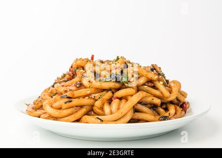 Aludone fritto su sfondo bianco Foto Stock