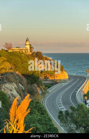 ROUTE N-11 FARO DI CALELLA (© MARIA PARELLADA 1859) CALELLA COSTA DEL MARESME CATALOGNA SPAGNA Foto Stock