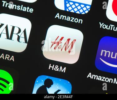Icona delle app H e M sulla schermata di Apple iPhone Foto Stock
