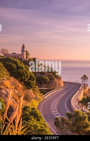 ROUTE N-11 FARO DI CALELLA (© MARIA PARELLADA 1859) CALELLA COSTA DEL MARESME CATALOGNA SPAGNA Foto Stock