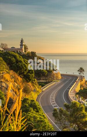 ROUTE N-11 FARO DI CALELLA (© MARIA PARELLADA 1859) CALELLA COSTA DEL MARESME CATALOGNA SPAGNA Foto Stock