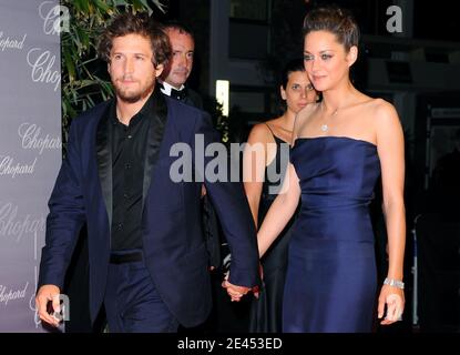 File photo : Marion Cotillard e Guillaume Canet partecipano alla festa del Trophee Chopard tenutasi al 'Baoli'l durante il 62° Festival del Cinema di Cannes al Palais des Festivals a Cannes, in Francia, il 18 maggio 2009. Quasi non appena le notizie si sono interrotte circa il divorzio di Brad Pitt e Angelina Jolie, la gente ha cominciato a puntare le dita. E la maggior parte erano rivolti alla sua co-stella alleata Marion Cotillard. Ma gli amici dell’attrice francese si sono precipitati verso la sua difesa, dicendo che sarebbe stata "assolutamente devastata" da suggerimenti che ha qualsiasi ruolo da svolgere nella sensazionale divisione, o che è stata infedele verso il suo partner, fel Foto Stock