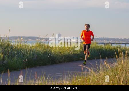 Man 50 Plus quando si fa jogging. Foto Stock