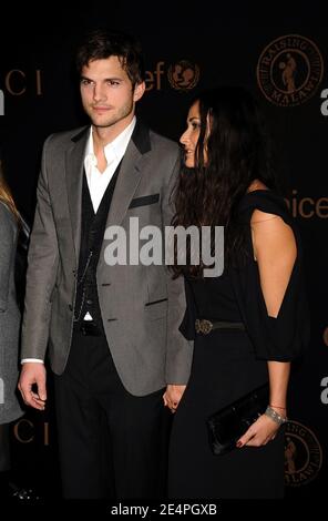 Ashton Kutcher e la moglie Demi Moore che arrivano per Gucci e Madonna ospitano UNA Notte a beneficio allevando Malawi e Unicef, tenutasi presso il United Nations Plaza a New York City, NY, USA, 6 febbraio 2008. Foto di David Miller/ABACAPRESS.COM Foto Stock