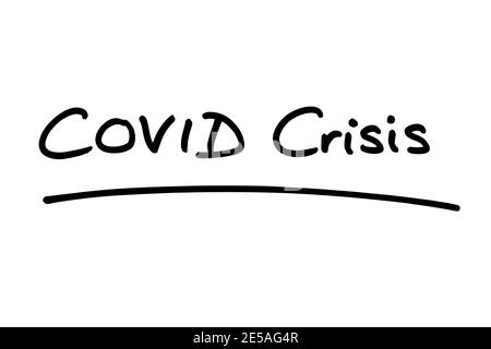 COVID Crisis, scritto a mano su sfondo bianco. Foto Stock