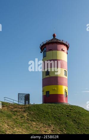 Faro di Pilsum, Pilsum, Krummhiern, Frisia orientale, bassa Sassonia, Germania Foto Stock