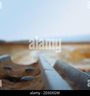 Closeup bulldozer, cava, concetto di background industriale Foto Stock