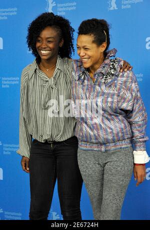 Actresses Aissa Maiga (L) and Anisia Uzeyman attend a photocall to promote the movie 'Aujourd'hui - Tey' at the 62nd Berlinale International Film Festival in Berlin February 10, 2012.  REUTERS/Morris Mac Matzen  (GERMANY - Tags: ENTERTAINMENT)