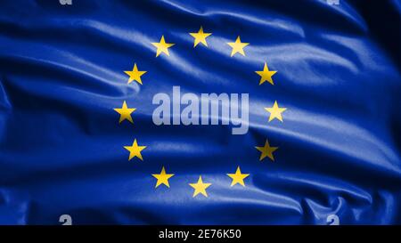 Bandiera dell'Unione europea che oscilla nel vento. Primo piano della soffiatura di striscioni in Europa, seta morbida e liscia. Tessuto tessuto tessuto tessitura segno sfondo. Usalo per na Foto Stock