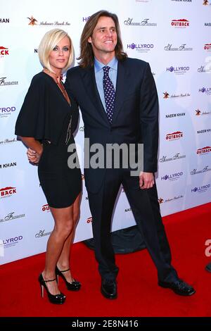 Jenny McCarthy e Jim Carrey arrivano per l'Holly Robinson Peete e Rodney Peete DesignCare 2007, il 9° fundraiser annuale a beneficio della lotta contro la malattia debilitante e le circostanze di vita, tenuto presso la casa di Tammy e Eric Gustavson a Malibu, CA, USA il 21 luglio 2007. Foto di Brian Lindensmith/ABACAPRESS.COM Foto Stock