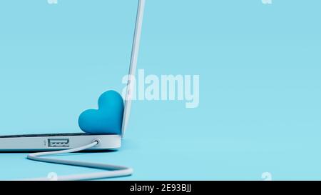 Computer portatile con piccolo cuore blu. Online dating concept background 3D rendering Foto Stock