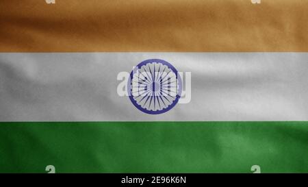 Bandiera indiana di Tiranga che oscilla nel vento. Primo piano di India banner soffiaggio, morbido e seta liscia. Tessuto tessuto tessuto tessitura segno sfondo. Usalo per nat Foto Stock