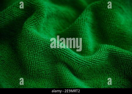 Tessuto verde degli asciugamani sfondo. Tasto basso. Foto Stock