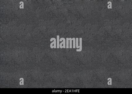 Struttura dell'asfalto - vista dall'alto e primo piano di un frammento di una vecchia strada asfaltata Foto Stock