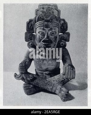 Art mexicain.Divinité Zapotèque,représentant le Prince des Fleurs,dieu de la Joie,de la Musique et de la Danse.Corps peint et tatoué avec motivi géomé Foto Stock