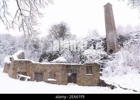 Keld testa miniera di piombo in neve pesante Foto Stock