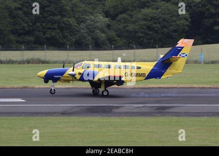 G-SMMB, un Caravan II Reims-Cessna F406 gestito da Airtask Group per conto di Marine Scotland, presso l'aeroporto internazionale di Prestwick in Ayrshire. Foto Stock