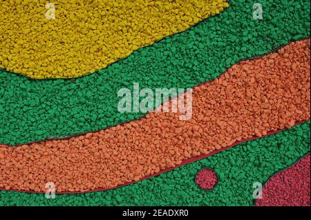 Pietre dipinte in diversi colori per il design paesaggistico Foto Stock