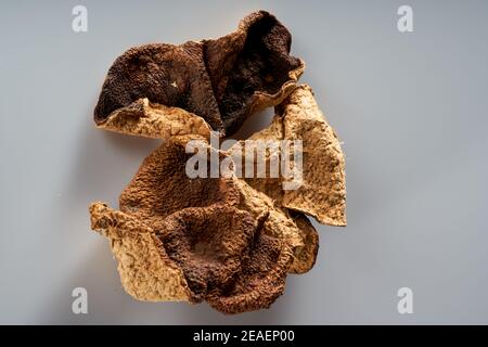 Primo piano di una pila di tangerine di alta qualità che hanno è stato immagazzinato per dieci anni Foto Stock