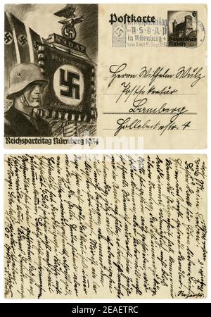 German Historical cartolina postale: il sesto congresso di partito della NSDAP a Norimberga nel 1934, SS alfiere in un casco in acciaio. Germania, Terzo Reich Foto Stock