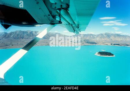 1992 Nuova Zelanda Tekapo - Glacier Fed Lake Tekapo da Un aereo leggero che vola verso il Mount Cook National Park South Isola Nuova Zelanda Foto Stock