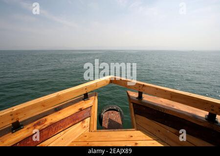 Barca sul mare di Galilea Foto Stock