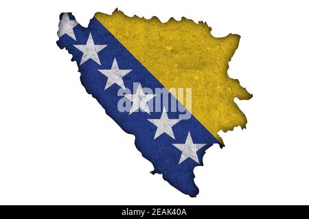 Mappa e bandiera della Bosnia-Erzegovina sul cemento intemperie Foto Stock