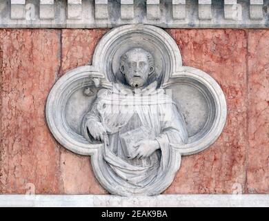 San Domenico di Paolo di Bonaiuto rilievo sulla facciata della Basilica di San Petronio a Bologna Foto Stock