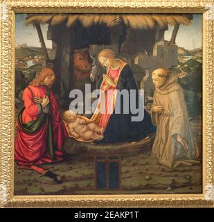 Scena della Natività con i santi Julian e Francesco, la scuola di Domenico Ghirlandaio nella Basilica di San Lorenzo in Firenze, Italia Foto Stock