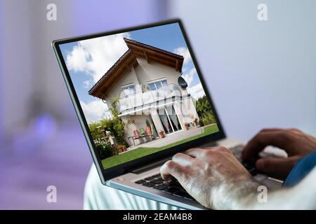 Ricerca in linea della casa di bene immobile Foto Stock