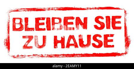 Cornice stencil rossa: Soggiorno a casa in lingua tedesca banner Foto Stock