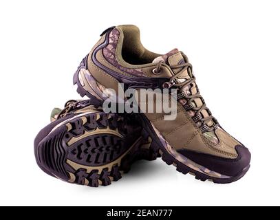 scarpe da trekking da uomo isolate su bianco Foto Stock