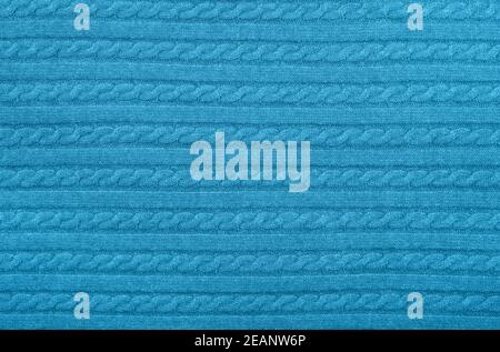 Trama di fondo di tessuto di lana lavorato a maglia blu Foto Stock