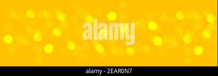 Bokeh blurry multicolore su sfondo giallo Foto Stock