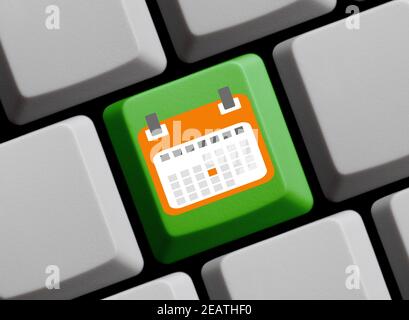 Calendario o programma online - illustrazione 3D della tastiera verde del computer Foto Stock