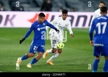 Cucho Hernandez di Getafe e Marvin Park del Real Madrid In azione durante la partita di calcio del campionato spagnolo la Liga Betwe / LM Foto Stock