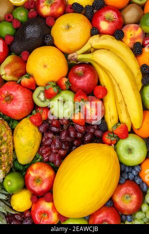 Cibo fondo raccolta frutti mele bacche ritratto formato banana arance frutta Foto Stock